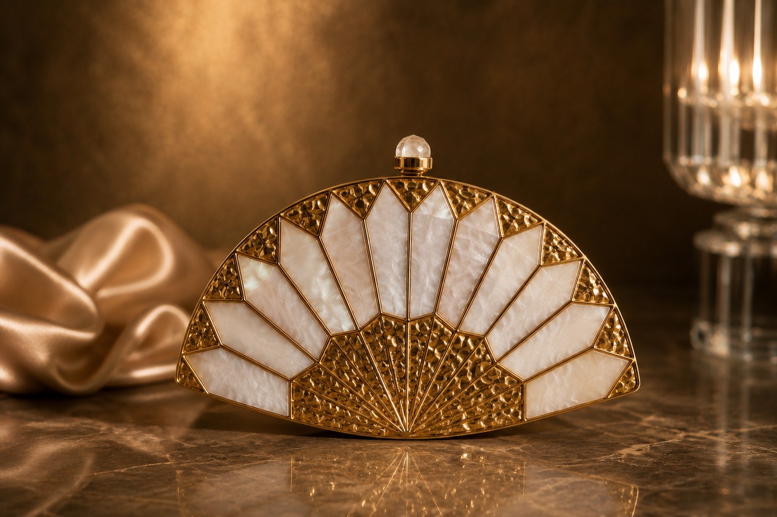 Gold filigree fan clutch with mother-of-pearl panels and crystal clasp